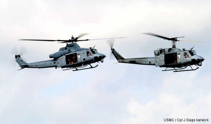 UH-1N Huey (Right) and UH-1Y Venom (Left) during the final flight of the UH-1N Huey for HMLA-773,  New Orléans NAS JRB, Aug 28, 2014